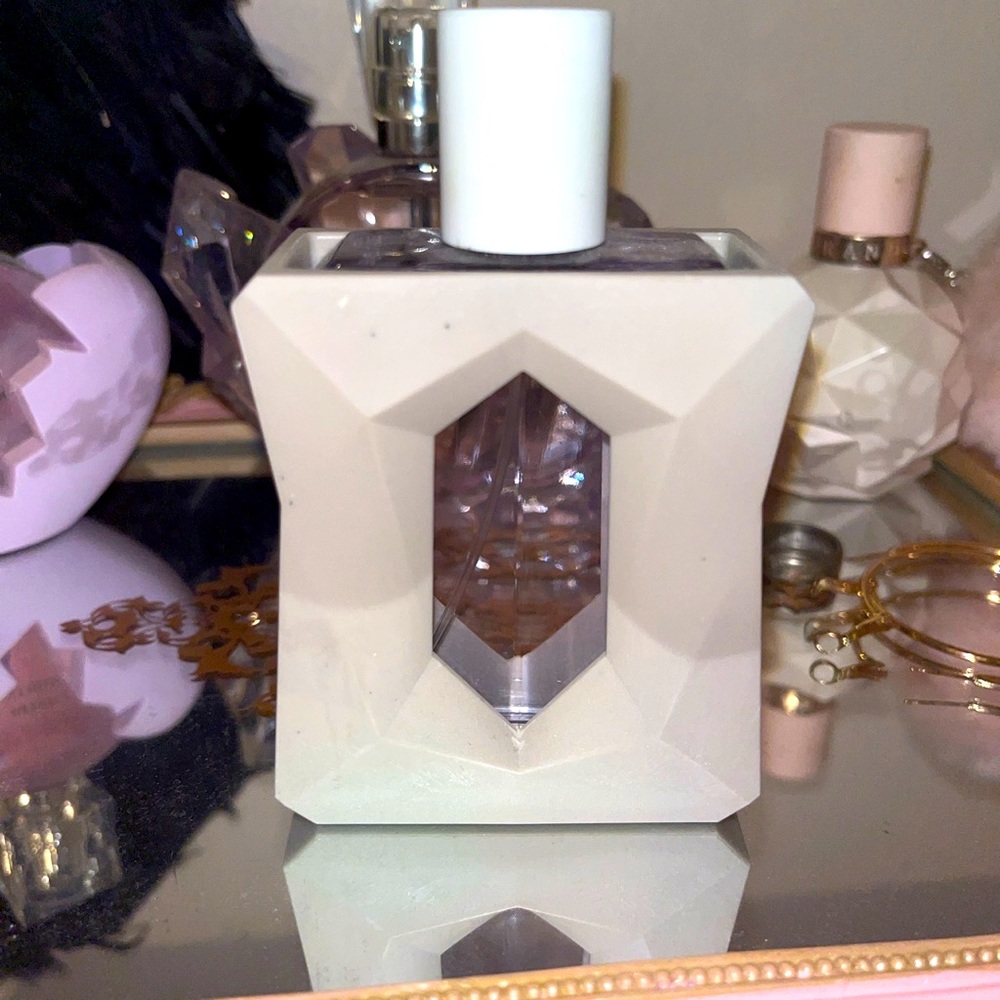 Ariana grande god is a woman perfume